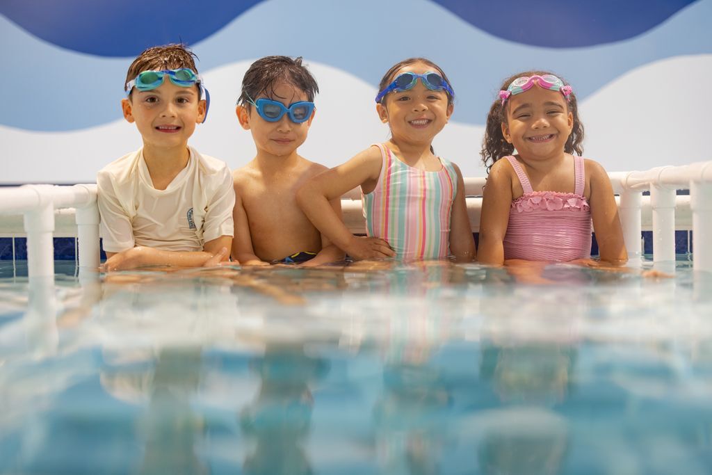 Four children in swim lessons
