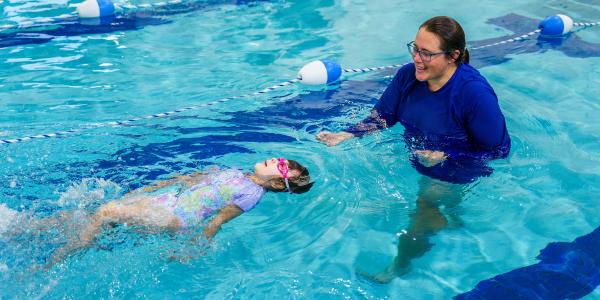 swimmer and instructor